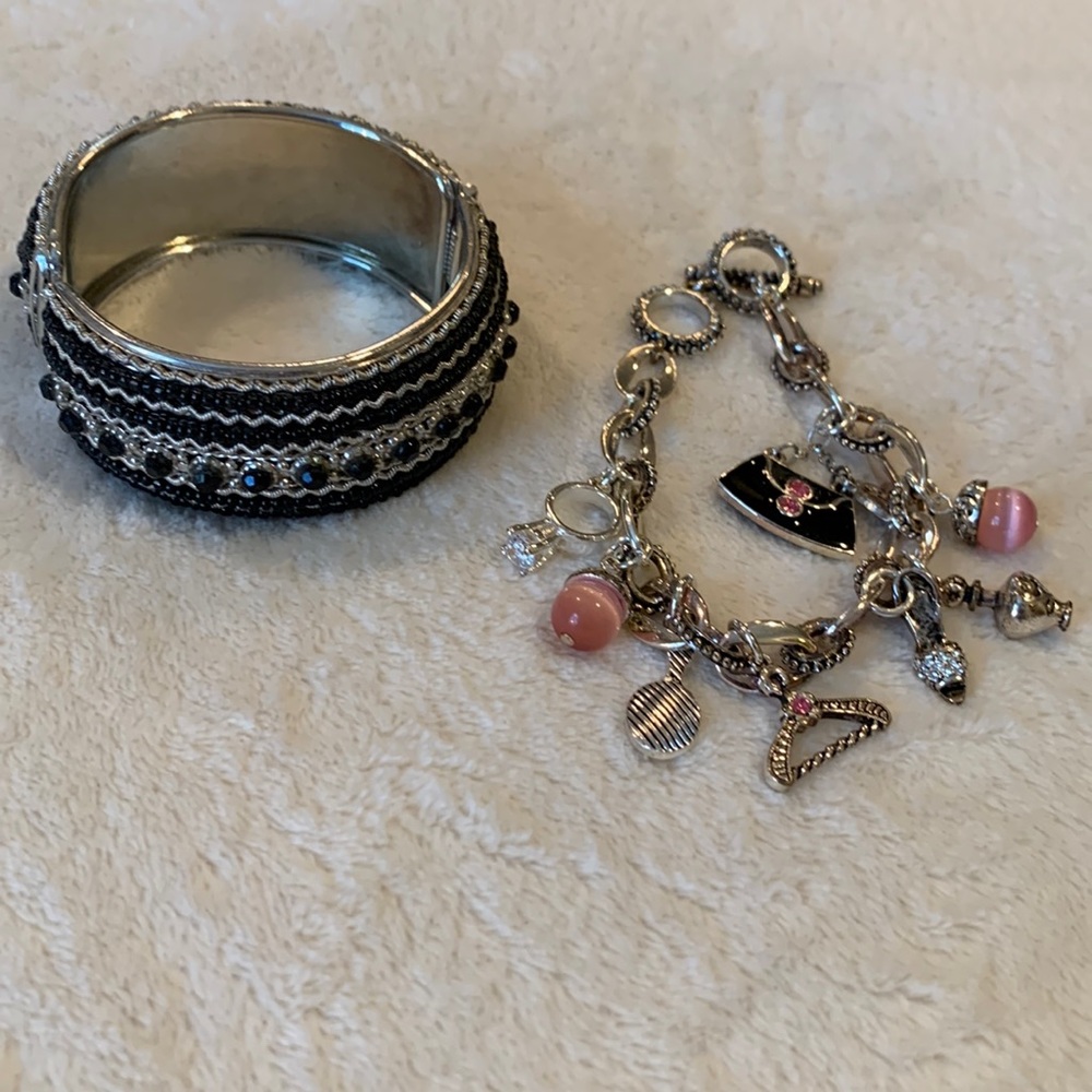 Silver charm bracelet with black and silver bangle